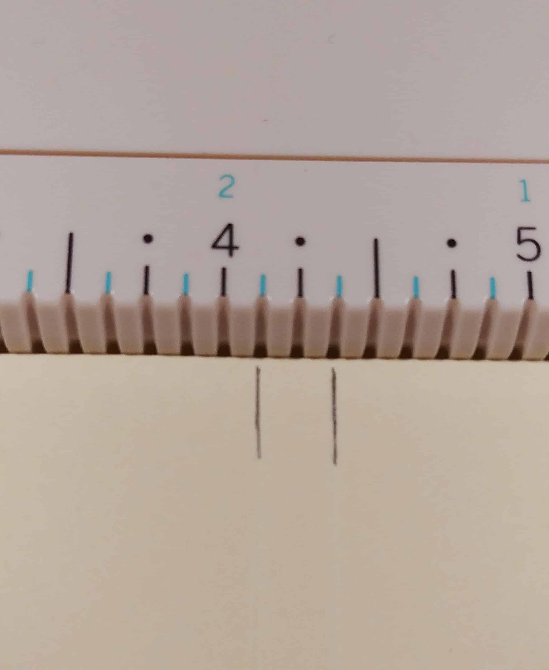 close up of measurement for fidget spinner birthday card