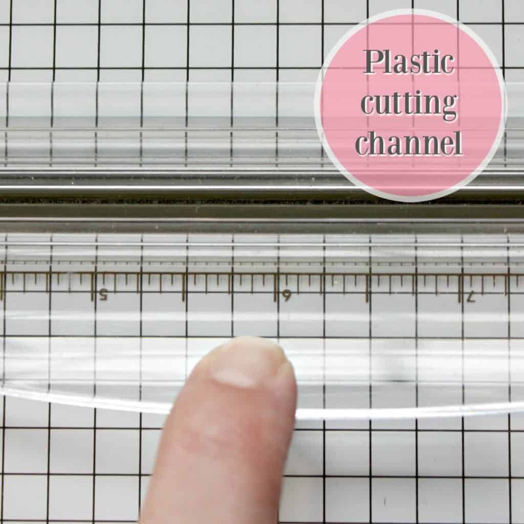 Plastic cutting channel in a paper trimmer